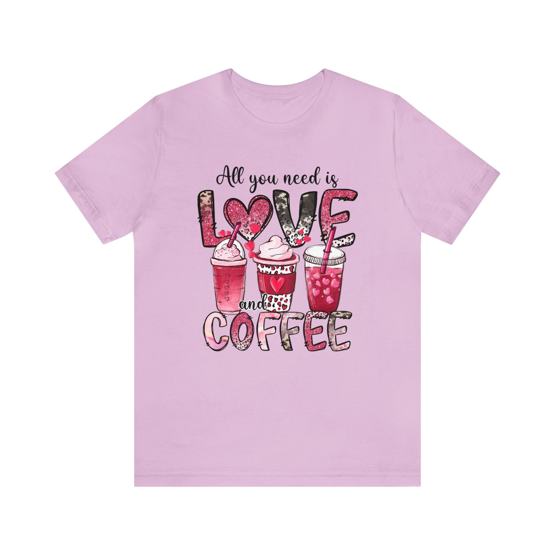 Lilac Colored t-shirt with coffee graphic on front.  Three different style of coffees and the words "All You Need is Love and Coffee".  Back of shirt is plain , no graphic.