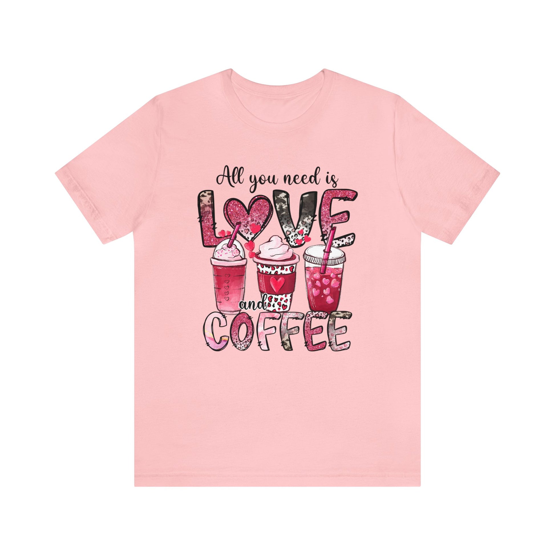 Pink Colored t-shirt with coffee graphic on front.  Three different style of coffees and the words "All You Need is Love and Coffee".  Back of shirt is plain , no graphic.