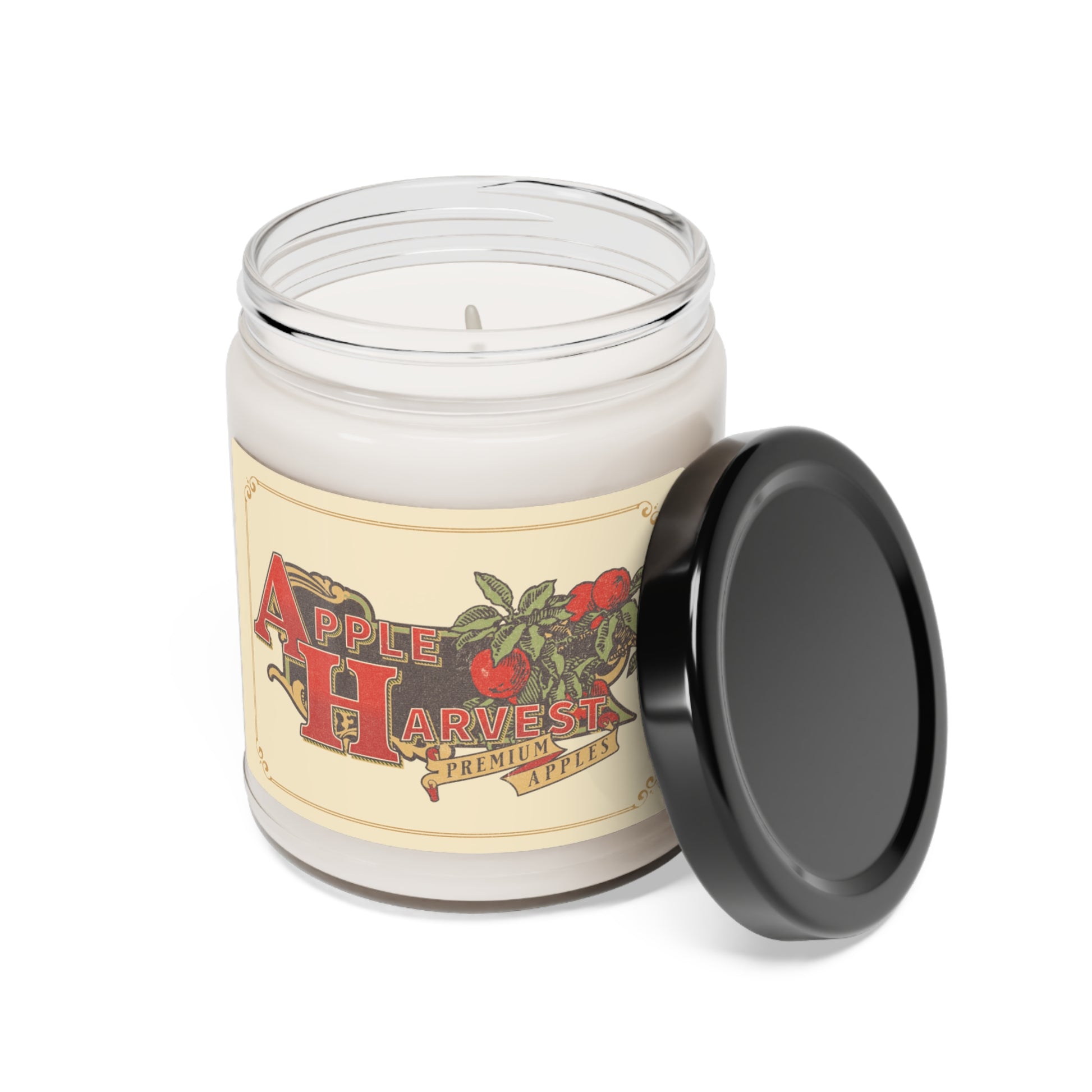 Apple Harvest 9 oz soy candle with lid leaning on jar