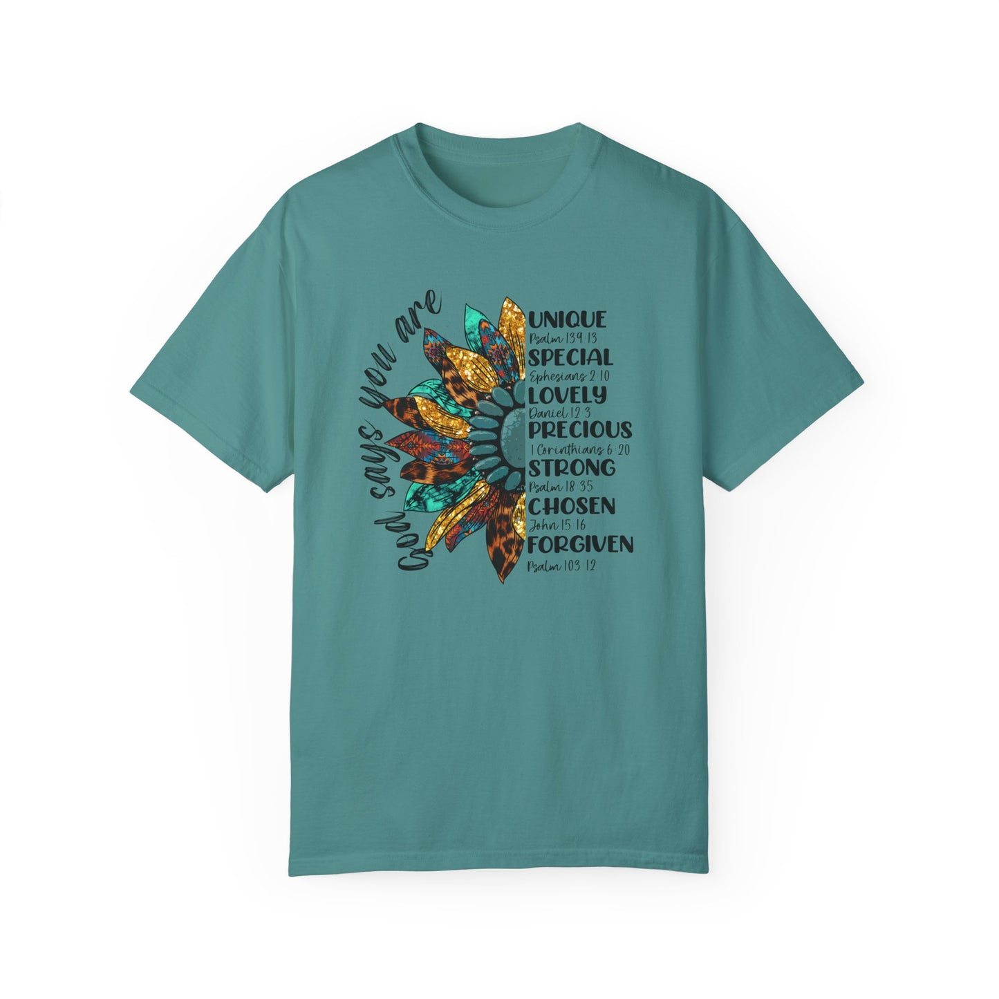 Seafoam color t-shirt with half a sunflower with gold, teal and leopard print petals and a teal middle with the words "God says you are" arching it on the left of the flower and the words listed with referenced bible verses "unique, special, lovely, precious, strong, chosen and forgiven" filling the the opposite side of the flower