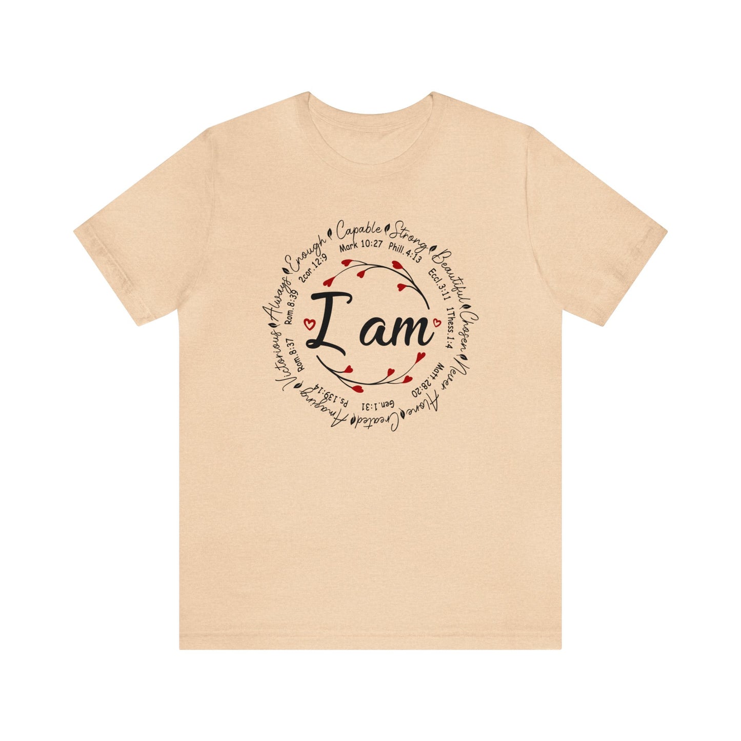 Heather Sand Dune color graphic t-shirt with "I Am" in the middle"  Surrounded by branches with hearts as the buds then further surrounded on the outside of the circle the words "Capable, strong, beautiful, chosen, Never Alone, Created, Amazing, Victorious, Always, Enough" with corresponding bible verse references under each word.  Graphic is on the front and the back is plain, no graphic.