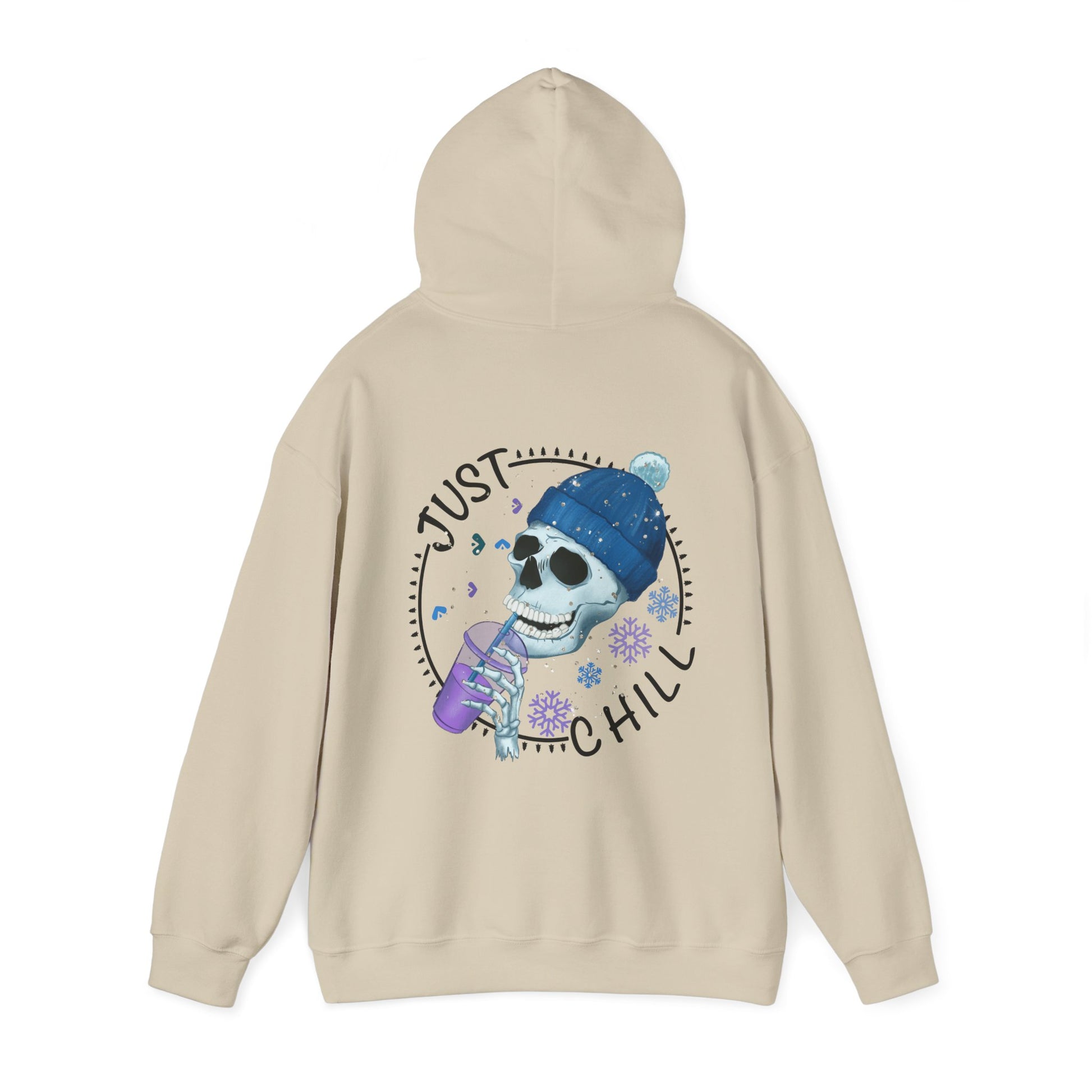 Sand colored hoodie with graphic on front and back. Front has snow flake on left pocket chest pocket area.  Back has a cute skeleton with winter hat drinking an iced coffee surrounded by the words just chill in a circle with decorative elements filling the gap between the words in a circle.  Circle also has snowflakes filling in the open space around the skeleton.