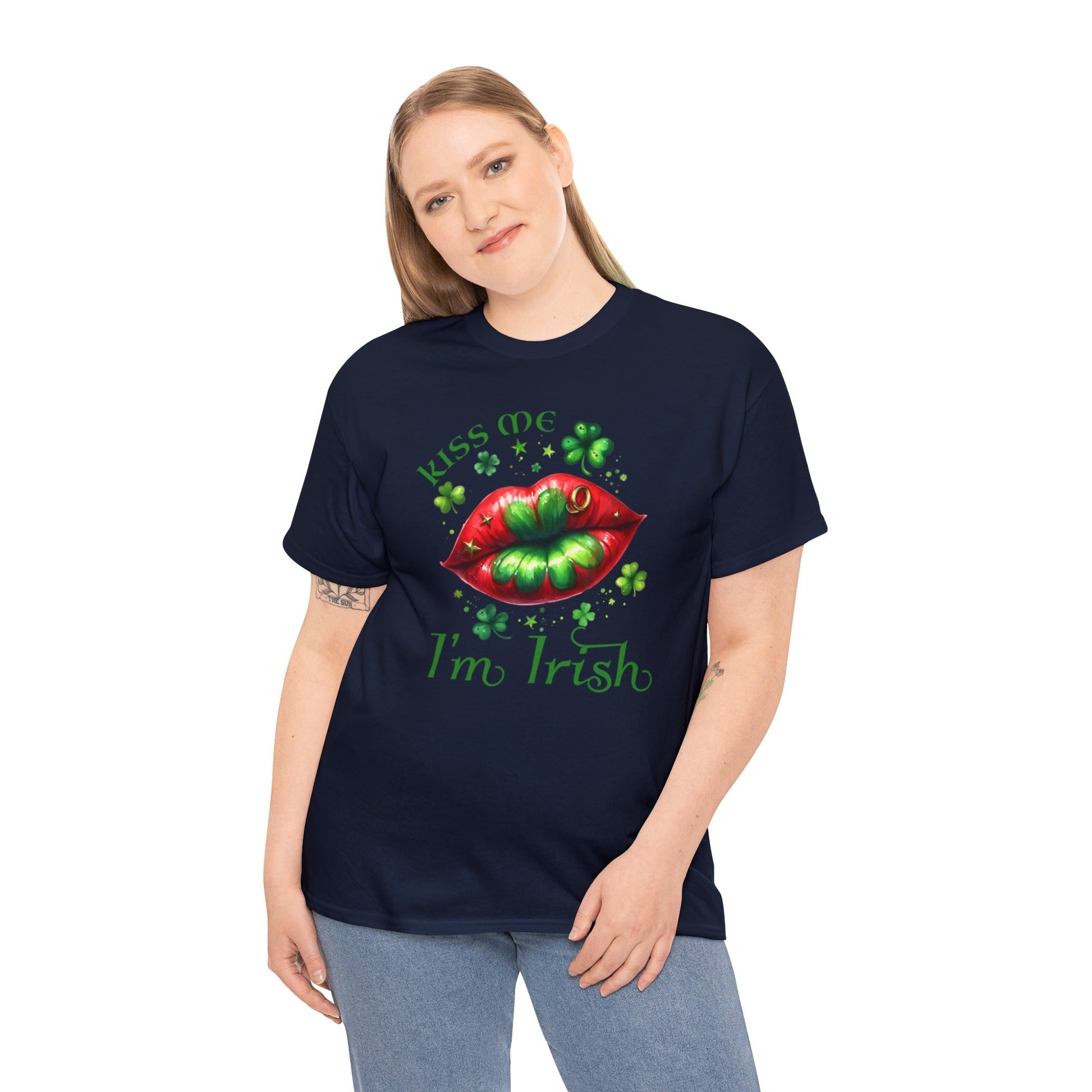 Navy color St. Patrick's Day T-shirt.  Graphic is red lips with green shamrock in the middle surrounded by various sizes of shamrocks and the words "Kiss Me I'm Irish" to complete the graphic. Woman Mock-up