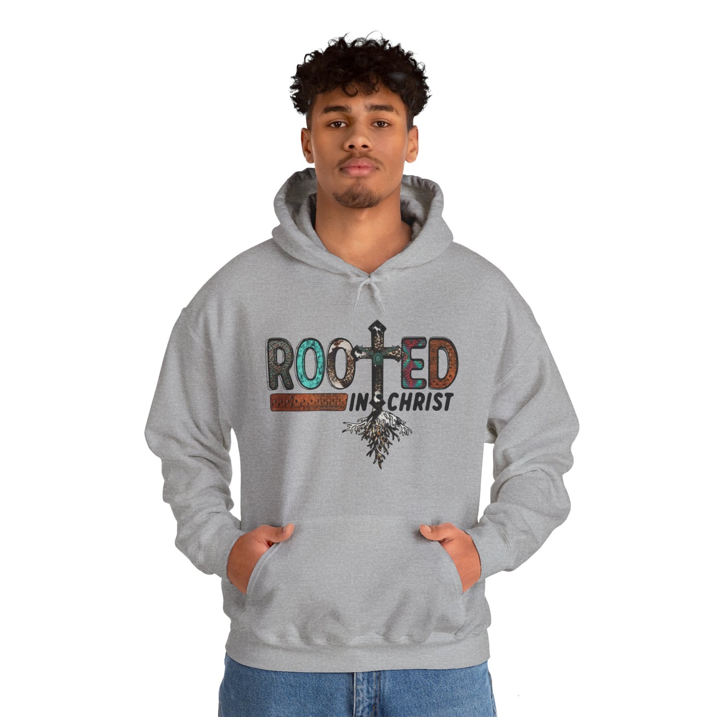 Sport Grey colored hoodie sweatshirt with the words Rooted in Christ across the chest with roots growing out of the T in the word rooted represented by a cross