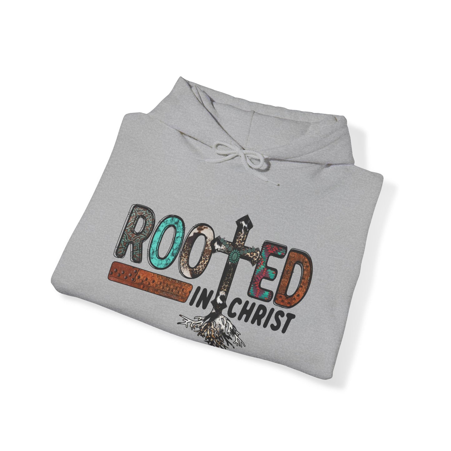 Folded Sport Grey colored hoodie sweatshirt with the words Rooted in Christ across the chest with roots growing out of the T in the word rooted represented by a cross