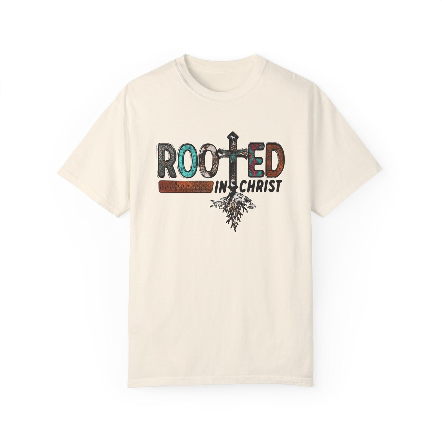 Ivory colored T-shirt with the words Rooted in Christ across the chest with roots growing out of the T in the word rooted represented by a cross