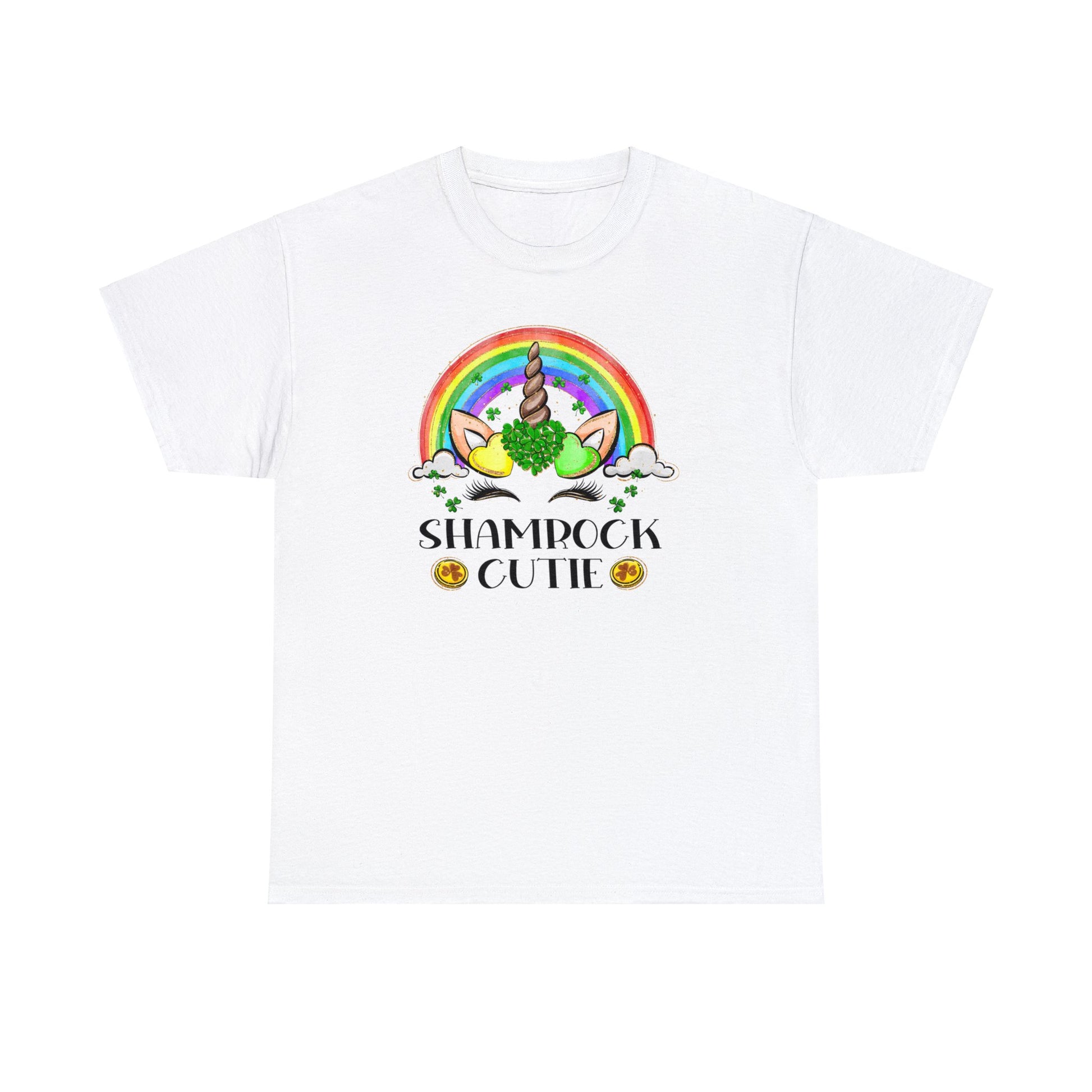 White color St. Patrick's Day T-Shirt with a rainbow surrounding a unicorn with hearts at the base of the horn one made up of shamrocks and the words Shamrock Cutie under the unicorn face.