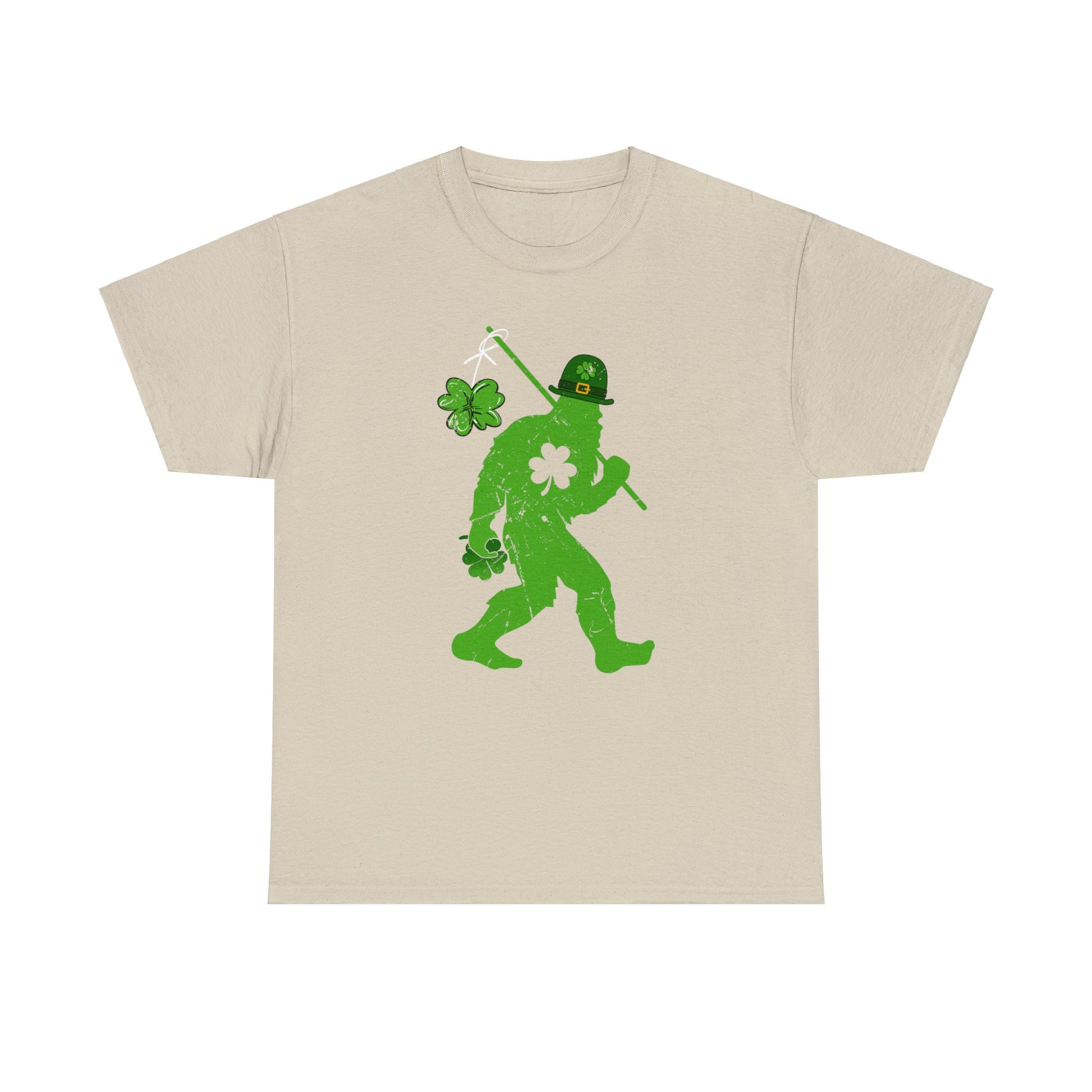 Sand color St. Patrick's Day T-shirt with bigfoot wearing a leprechaun hat carrying a fishing pole with a shamrock attached to it.